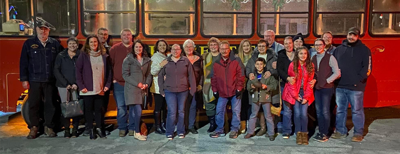 People standing by trolley